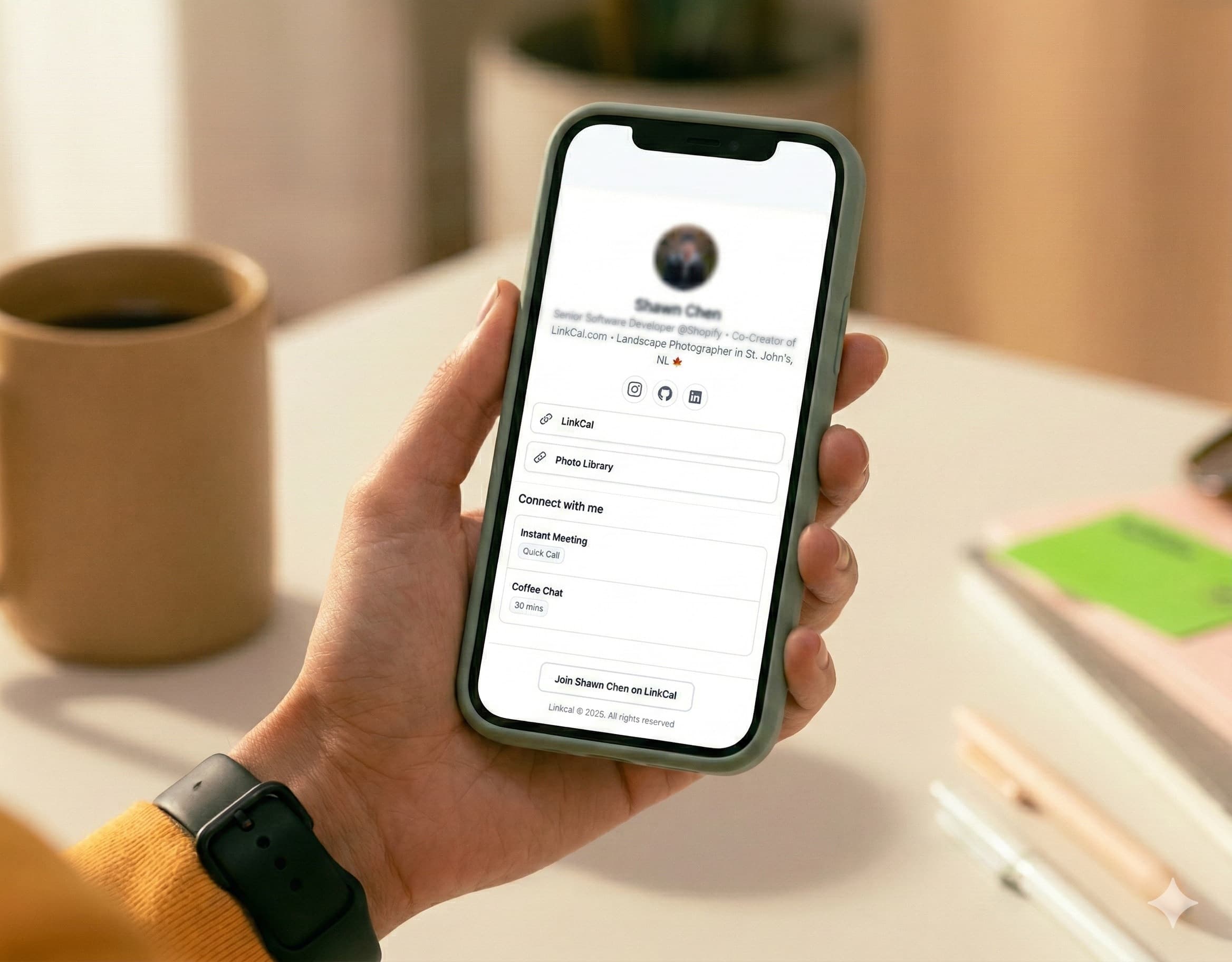 Hands holding phone with calendar app